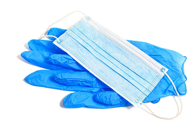 ภาพ: อุปกรณ์ป้องกันยาฆ่าเชื้อสัมผัสร่างกาย ถุงมือยางและหน้ากากอนามัย